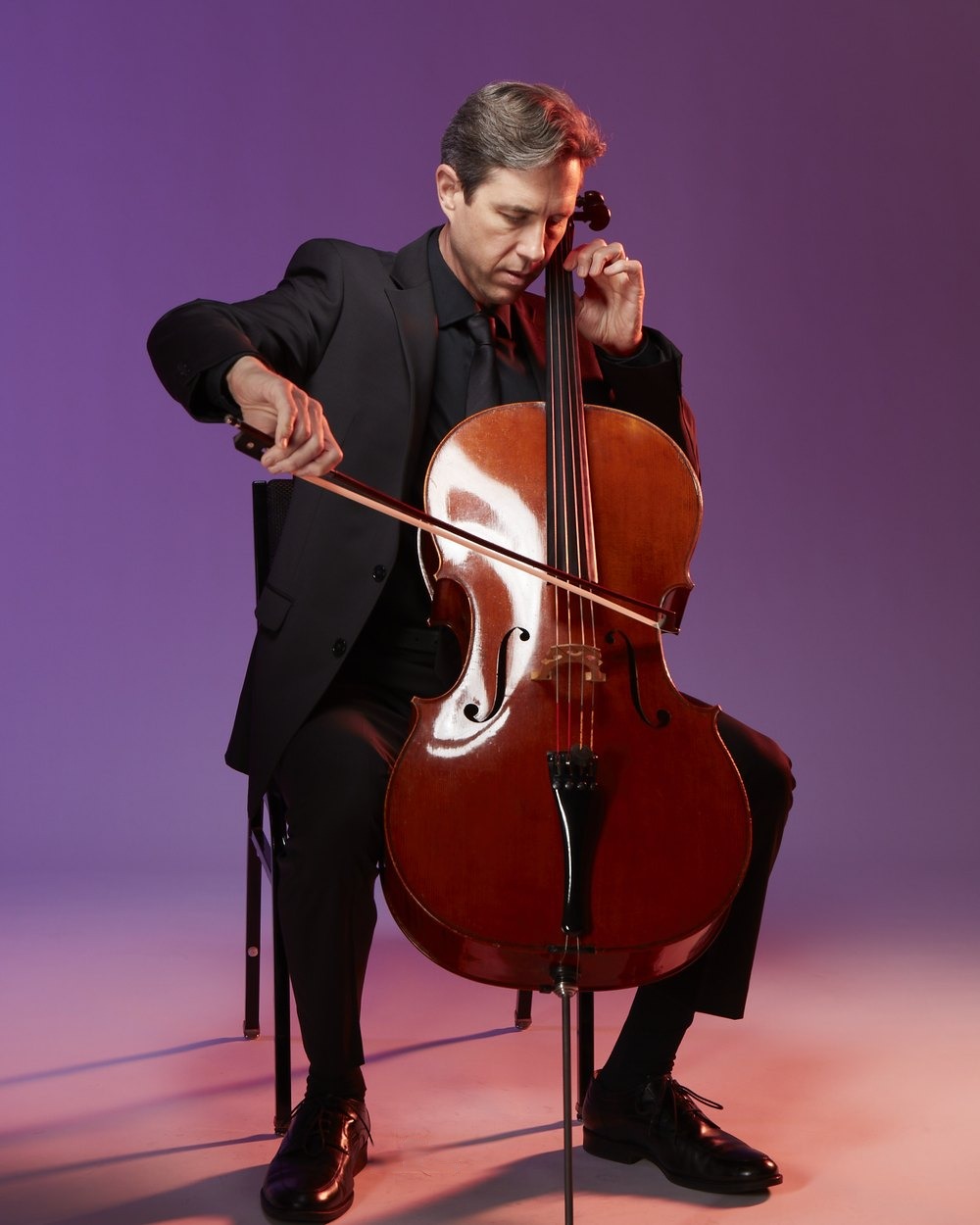 Jonathan Karoly, cellist and host of Impromptu Concerts